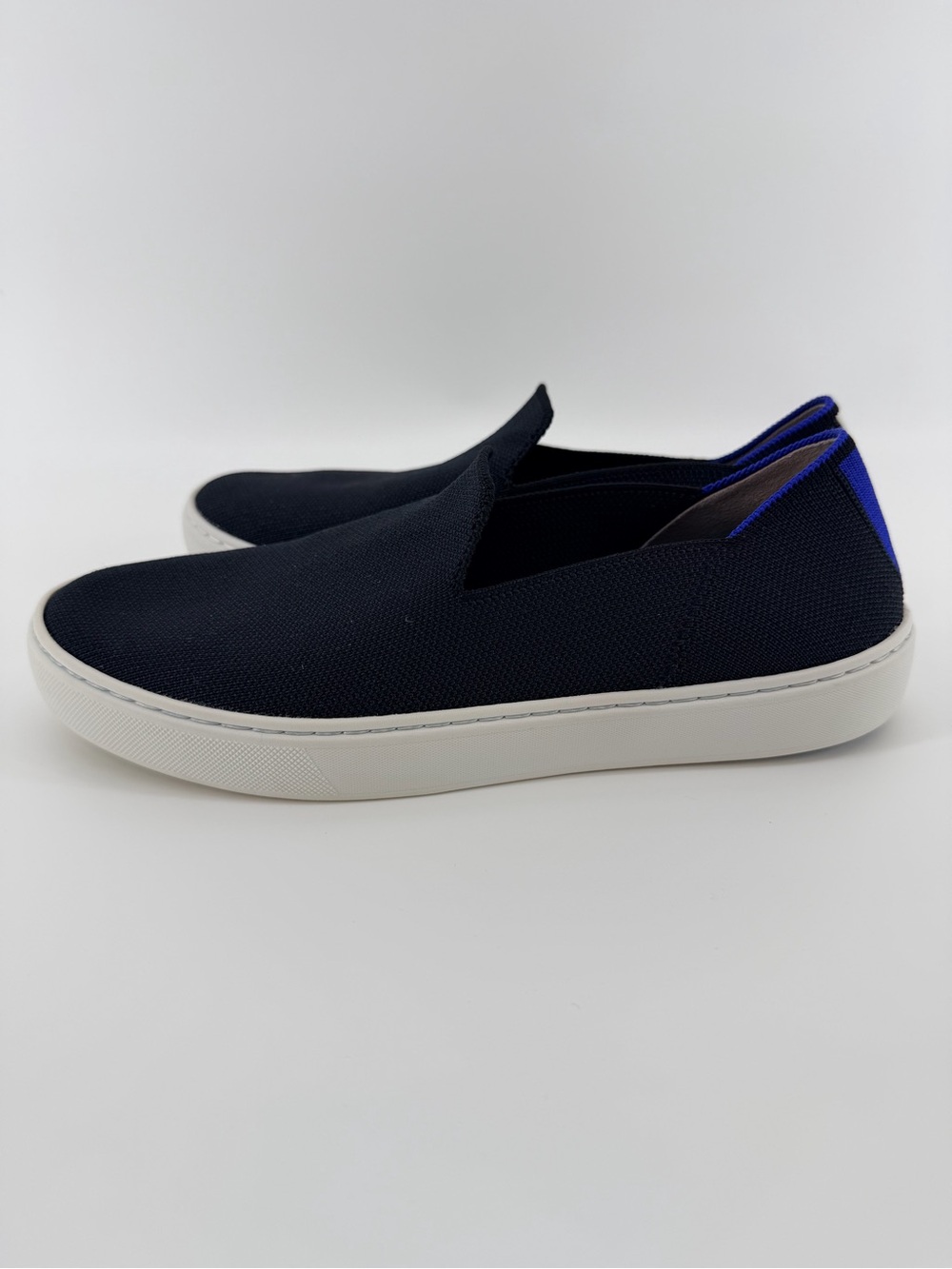 Rothy's Black Knit Original Slip-On Sneakers with Blue & White Heel Tabs - Picture 5 of 7